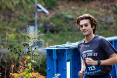 A young man runs at the Artful Dash 5K Run/Walk on the Karl Stirner Arts Trail in Easton, Pennsylvania.