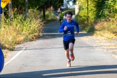 A boy runs at the Artful Dash 5K Run/Walk on the Karl Stirner Arts Trail in Easton, Pennsylvania.