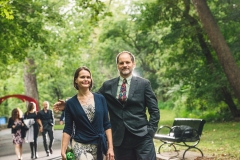 David and Kate Brandes walk past the red arch sculpture to the Karl Stirner Arts Trail gala fundraiser