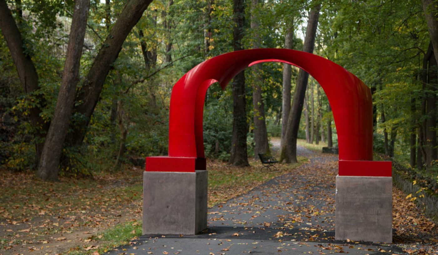 The iconic red Untitled (Arch for the KSAT) sculpture on the Karl Stirner Arts Trail