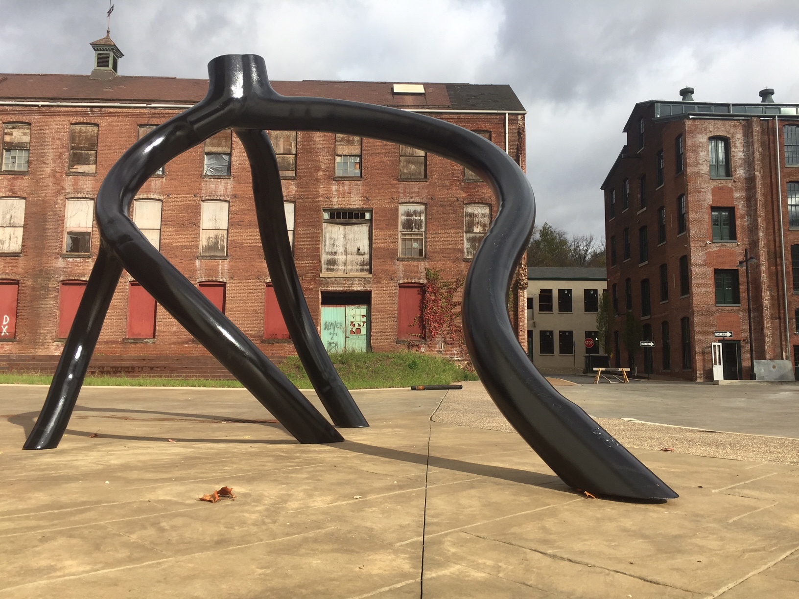 The black metal sculpture Black Steel Root by Steve Tobin on the Karl Stirner Arts Trail