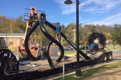 The Steve Tobin sculpture Black Steel Root is installed on the Karl Stirner Arts Trail.