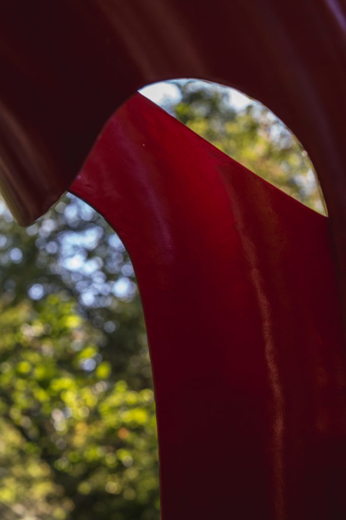 An inside view of a small portion of the red arch sculpture on the the Karl Stirner Arts Trail in Easton, Pennsylvania