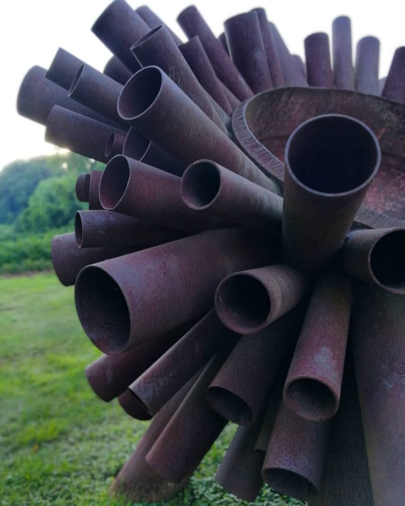A closeup view of a portion of the metal sculpture Sunflower by Steve Tobin at Hugh Moore Park in Easton, Pennsylvania