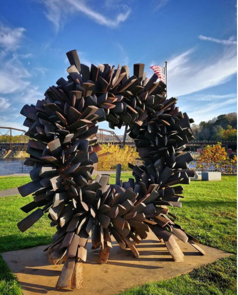 A metal sculpture by Steve Tobin called Wreath with that corresponding shape stands on the Karl Stirner Arts Trail in Easton, Pennsylvania.