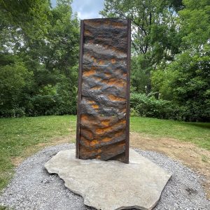 Made of cast iron, the sculpture called Upriver: Ripple Marks, one of five pieces in the Upriver installation by artist Heidi Wiren Bartlett, stands on the Karl Stirner Arts Trail in Easton, Pennsylvania.