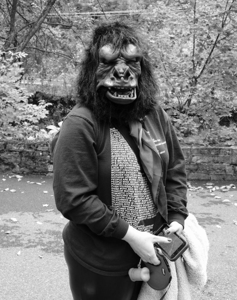 Someone with a gorilla mask on stands during the Come As You Art/Arf parade on the Karl Stirner Arts Trail in Easton, Pennsylvania.