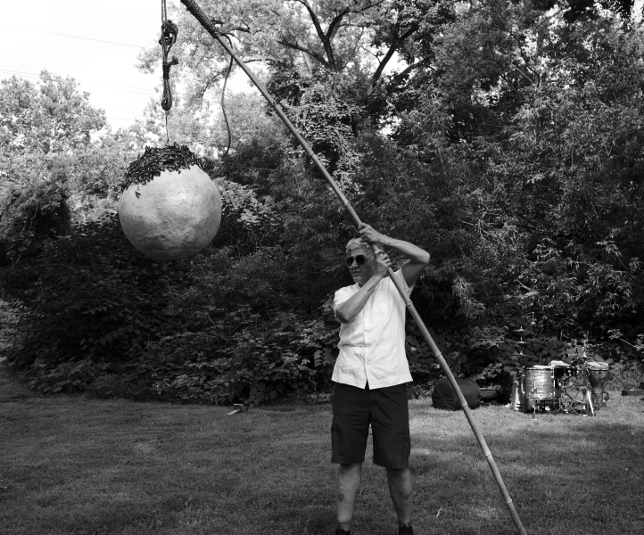 Nestor Gil holds the stick attached to a piñata during the LaJiraGira community picnic on the Karl Stirner Arts Trail in Easton, Pennsylvania.