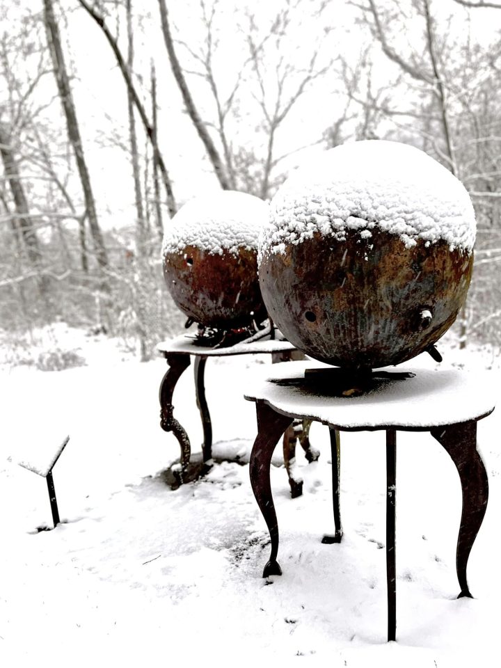 The two-part sculpture Hydrogen & Nitrogen is covered by snow on the Karl Stirner Arts Trail in Easton, Pennsylvania.