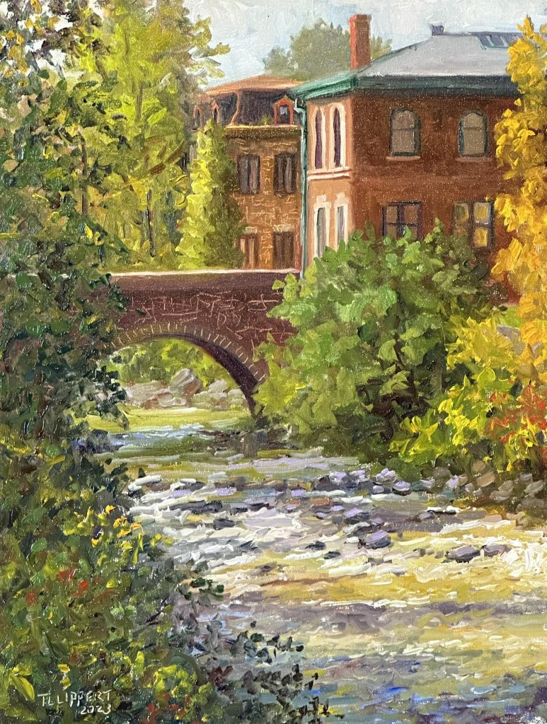 An oil painting by Tricia Lowrey Lippert of a portion of Bushkill Creek and the Silk complex as viewed from the Karl Stirner Arts Trail.
